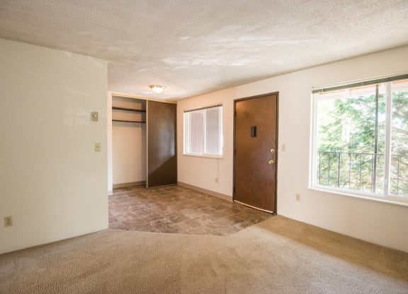 Cedar Lane Vacant Apartment Living Room & Entry Storage Closet