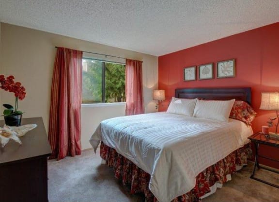 Model Apartment Master Bedroom at Chambers Creek Estates in University Place, WA 98467