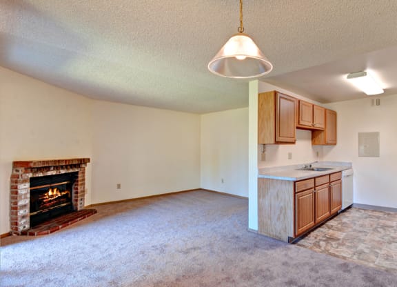Living Room With Fireplace at Chambers Creek Estates, University Place, WA 98467