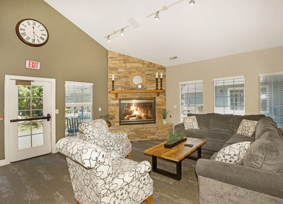 clubhouse lounge seating and fireplace  at Clackamas Trails Apartments, OR 97222
