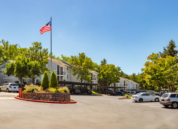 entry round about and parking lot  at Clackamas Trails Apartments, OR 97222