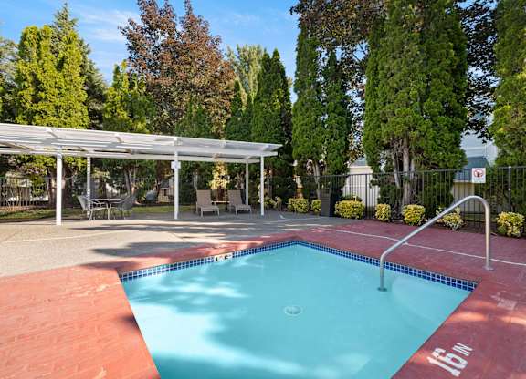 A small pool with a 15 Inches sign on the side at Clackamas Trails Apartments, Oregon, 97222
