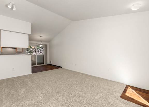 Empty room with a window and a door at Clackamas Trails Apartments, Oregon, 97222