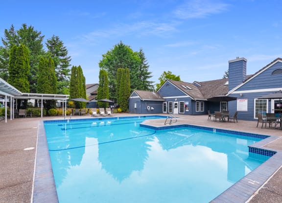 Creekside Village outdoor swimming pool clubhouse view