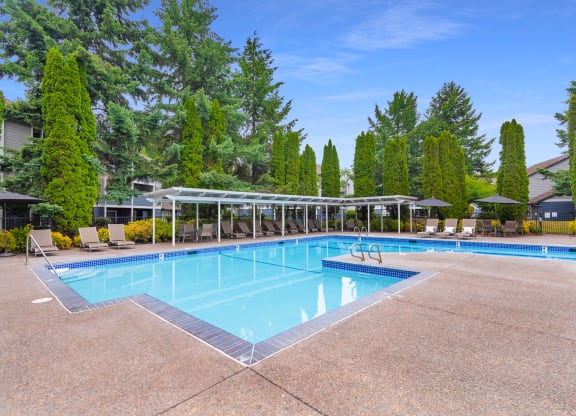 Creekside Village outdoor swimming pool and pool deck with furniture