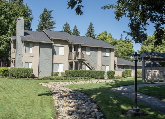 building exteriors and mail station at Delta Pointe Apartments, CA 95833