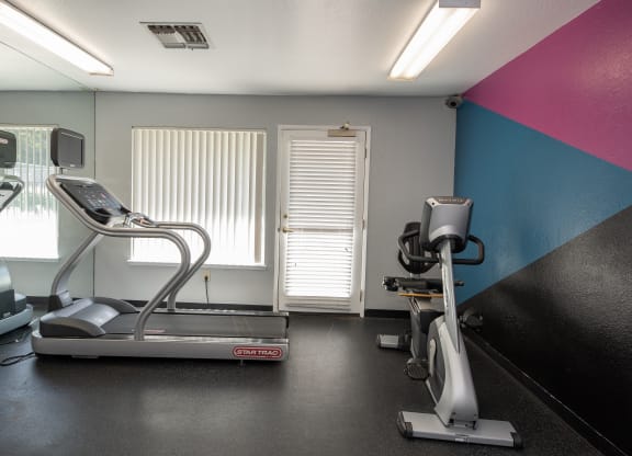 fitness center cardio equipment at Delta Pointe Apartments, Sacramento