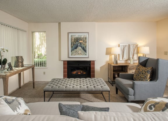 Model Living Room & Fireplace at Delta Pointe Apartments, Sacramento, CA