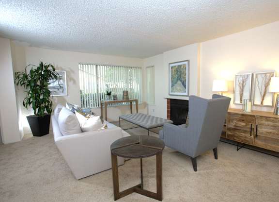 Delta Pointe model living room and fireplace side view