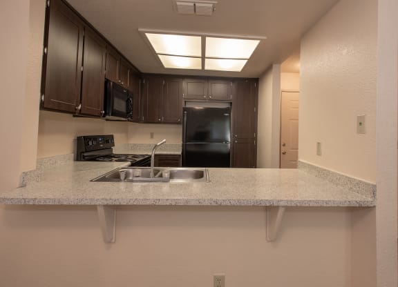 vacant kitchen bar at Delta Pointe Apartments, Sacramento