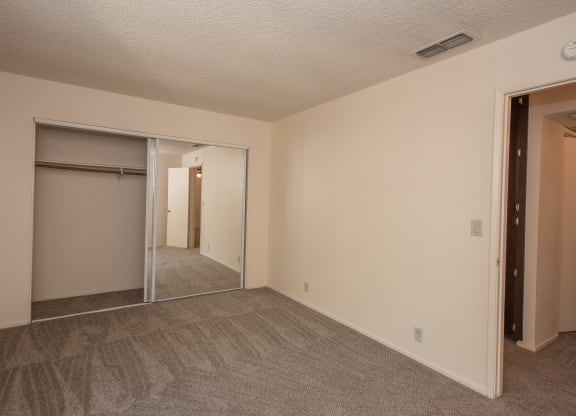 vacant second bedroom at Delta Pointe Apartments, Sacramento