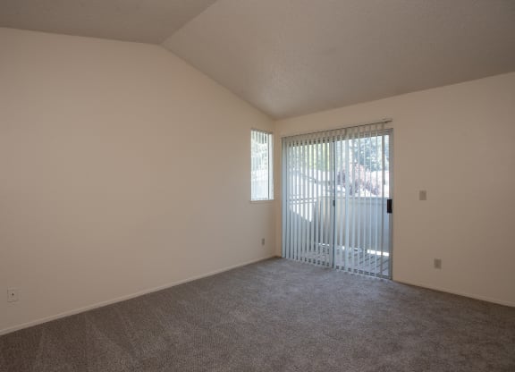 vacant primary bedroom deck at Delta Pointe Apartments, Sacramento, CA