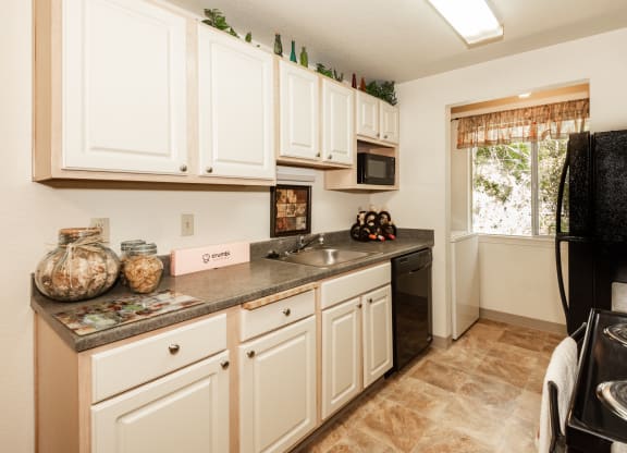 Kings Court Beaverton OR model kitchen and laundry