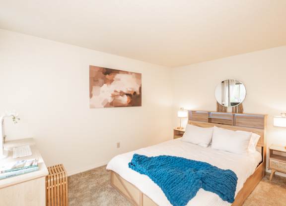 Model primary bedroom at King's Court Apartments, Beaverton, Oregon