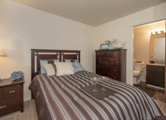 Pheasant Pointe Model Primary Bedroom and Bathroom