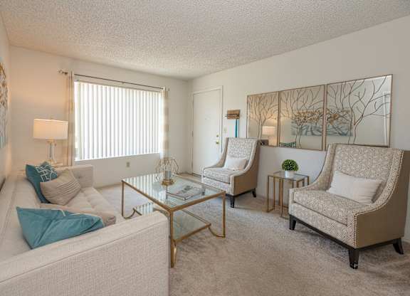 Model 2x2 living room long view at River Pointe, Sacramento, California