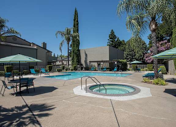 Side A swimming pool and spa with clubhouse view at River Pointe, Sacramento, California