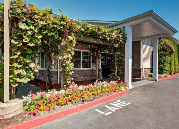 Clubhouse Exterior & Floral Landscaping at Riverwood Apartments, Washington, 98032