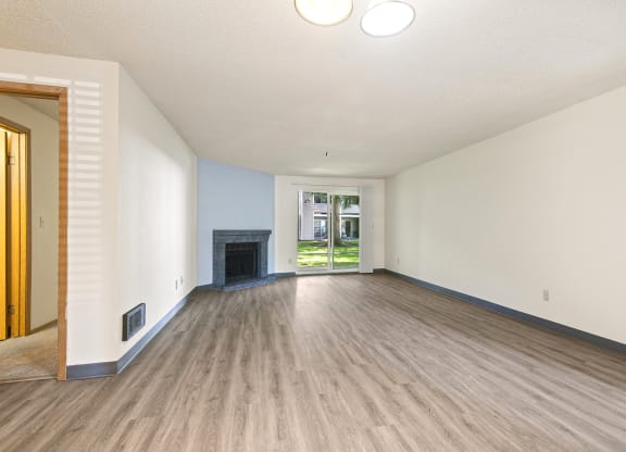 Riverwood vacant living room and fireplace