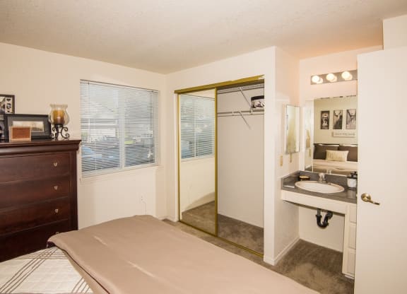Primary Bedroom Closet & Vanity at Sir Charles Court Apartments, Beaverton