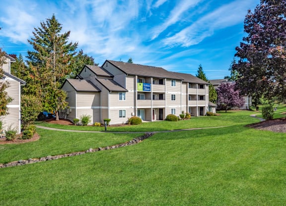 Sir Charles Court three story building exterior and green space, Beaverton, OR, 97006