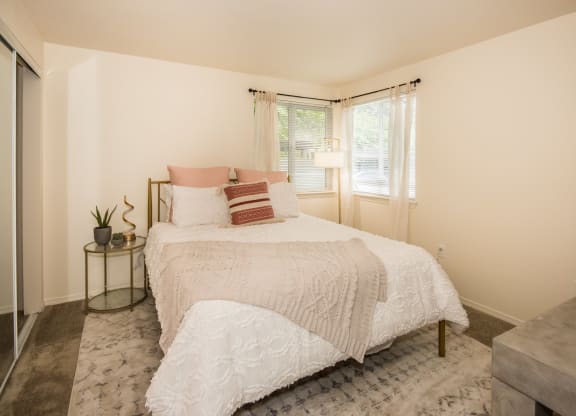 Model Primary Bedroom at St. Mary's Woods Apartments, Beaverton, OR