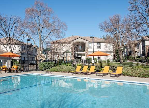 swimming pool and chaises side view at Stoneridge, Roseville, California