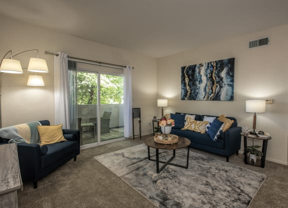 Model living room and patio slider at Sunset Summit, Rocklin, CA 95765