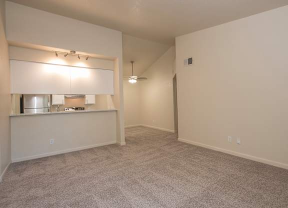 A spacious room with a carpeted floor at Sunset Summit, Rocklin, CA, 95765