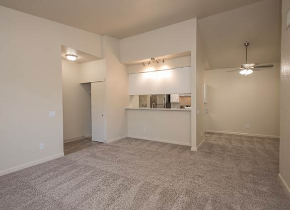 A spacious room with a carpeted floor at Sunset Summit, Rocklin, CA, 95765