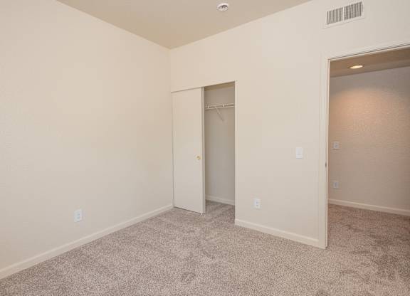 A room with a carpeted floor and a doorway leading to another room at Sunset Summit, Rocklin, CA, 95765