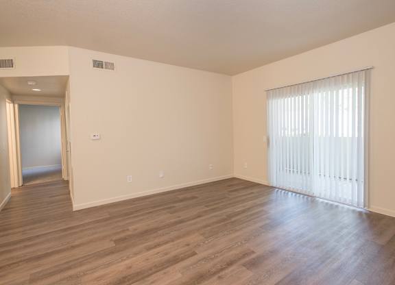A room with wooden floors and a window with blinds at Sunset Summit, Rocklin, CA, 95765