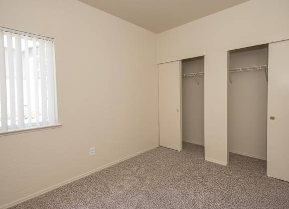 A room with a carpeted floor and a window with blinds at Sunset Summit, Rocklin, CA, 95765