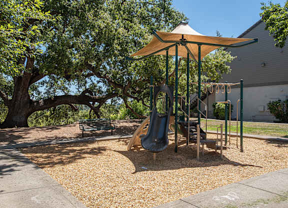 A playground with a shade structure at Sunset Summit, Rocklin, CA, 95765