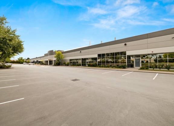 Sunset West Business Park office exteriors and parking lot