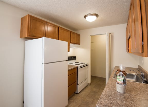Vacant Upgraded Apartment Kitchen & Pantry at Todd Village Apartments, Oregon