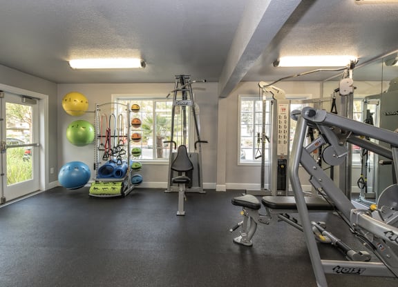 Fitness Center Equipment & Exit at Woodbridge Apartments, Sacramento, 95833