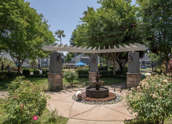 leasing office fountain and pool view at Woodbridge Apartments, California, 95833