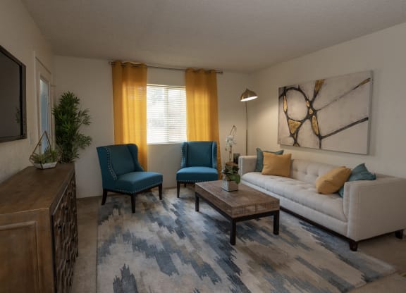model living room at Woodbridge Apartments, California, 95833
