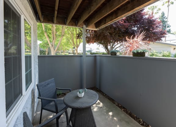 model patio and furniture at Woodbridge Apartments, Sacramento, California 95833