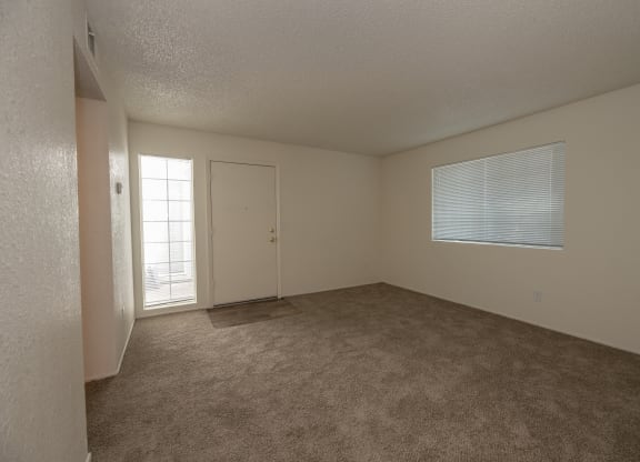 1x1 living room and entry at Woodbridge Apartments, Sacramento, California 95833