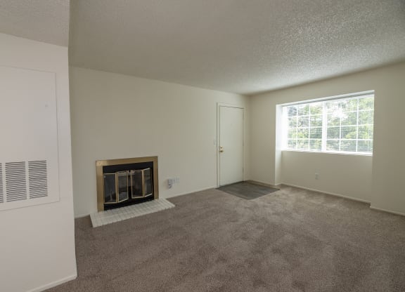 vacant 2x2 living room and entry at Woodbridge Apartments, California, 95833
