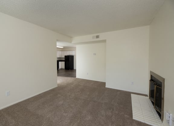 vacant 2x2 living room and kitchen view at Woodbridge Apartments, Sacramento, CA