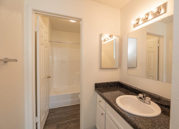 vacant 2x2 primary bathroom at Woodbridge Apartments, Sacramento, California 95833