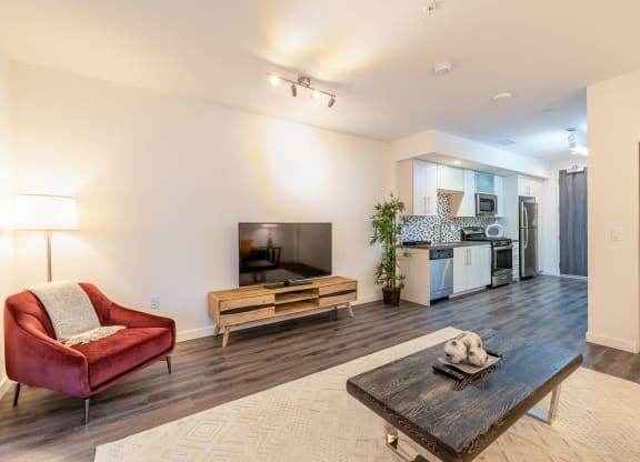 a living room with a couch and a table