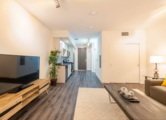 a living room with a couch and a tv