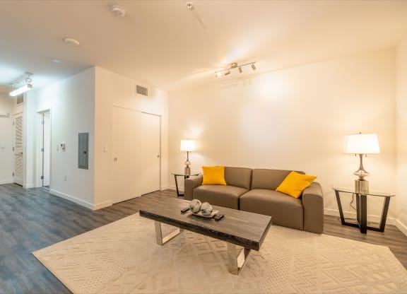a living room with a couch and a coffee table