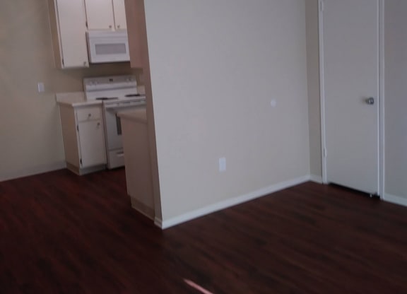 Front entry into living room at Teton Piines Apartments in Escondido, California.
