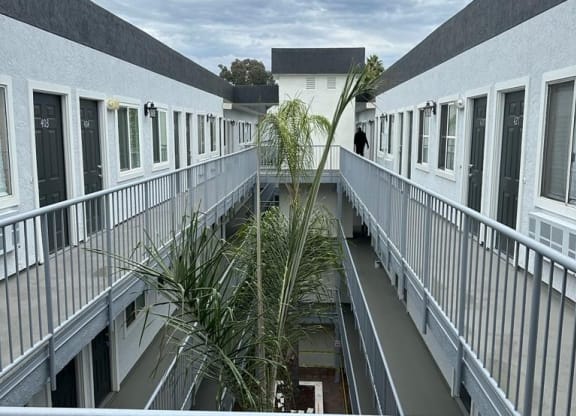 Top floor view of innear courtyard at the Atrium Apartments in downtown San Diego, CA.