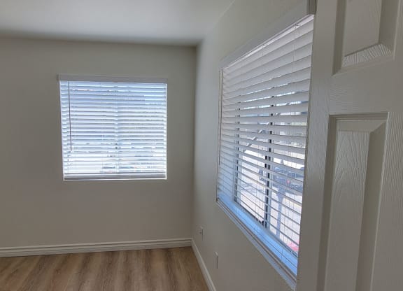 Entry to bedroom with lots of windows in one bedroom apartment at the Atrium Apartments in San Diego, CA.